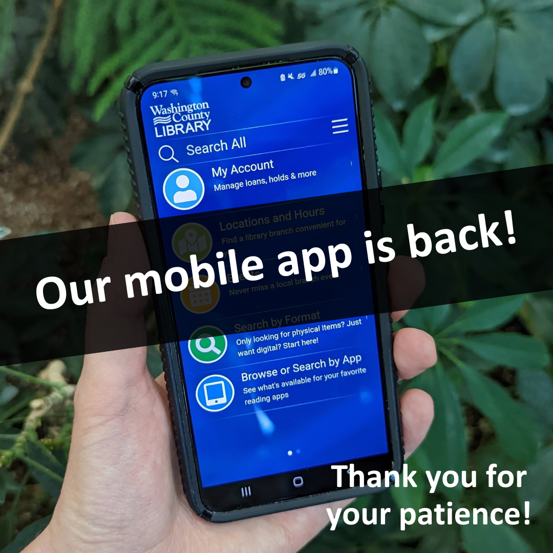 Hand holding a cell phone with the words 